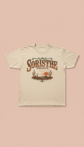 Vintage Western Lettering Tee, Default: 3/4 angle from slightly above product level, with garments laid flat on a cream or...